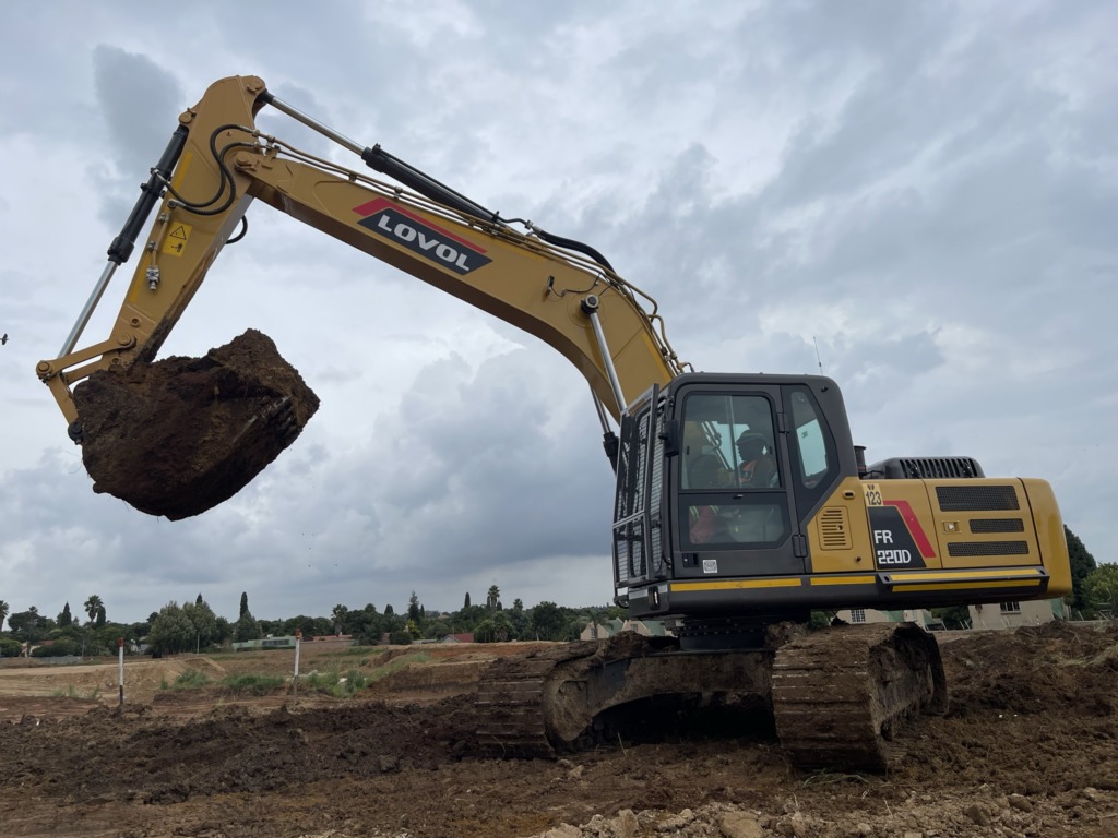 Excavator loading a tipper truck