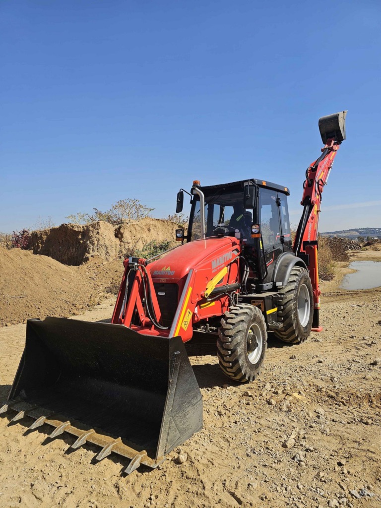 TLB on an earthworks site